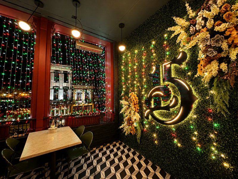 Commercial interior holiday lighting and greenery display, St. Petersburg FL